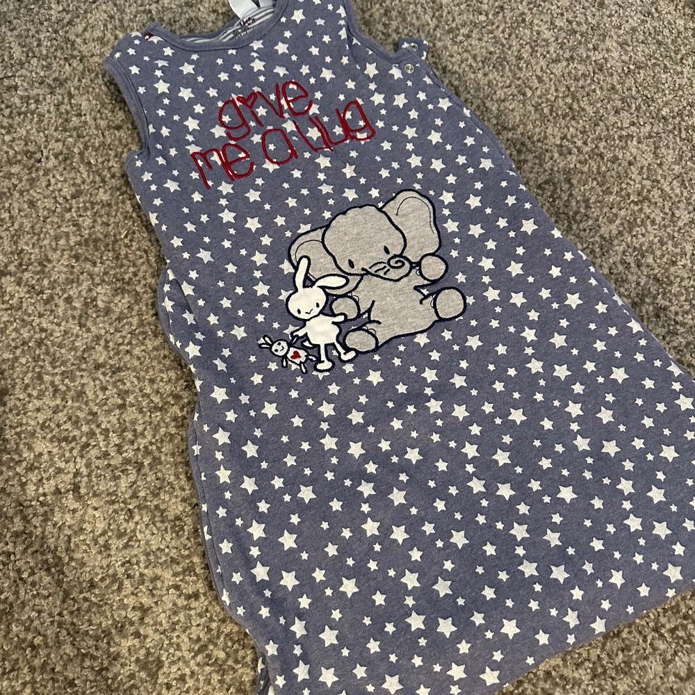Sleeping back for baby, buttoned and zipper
